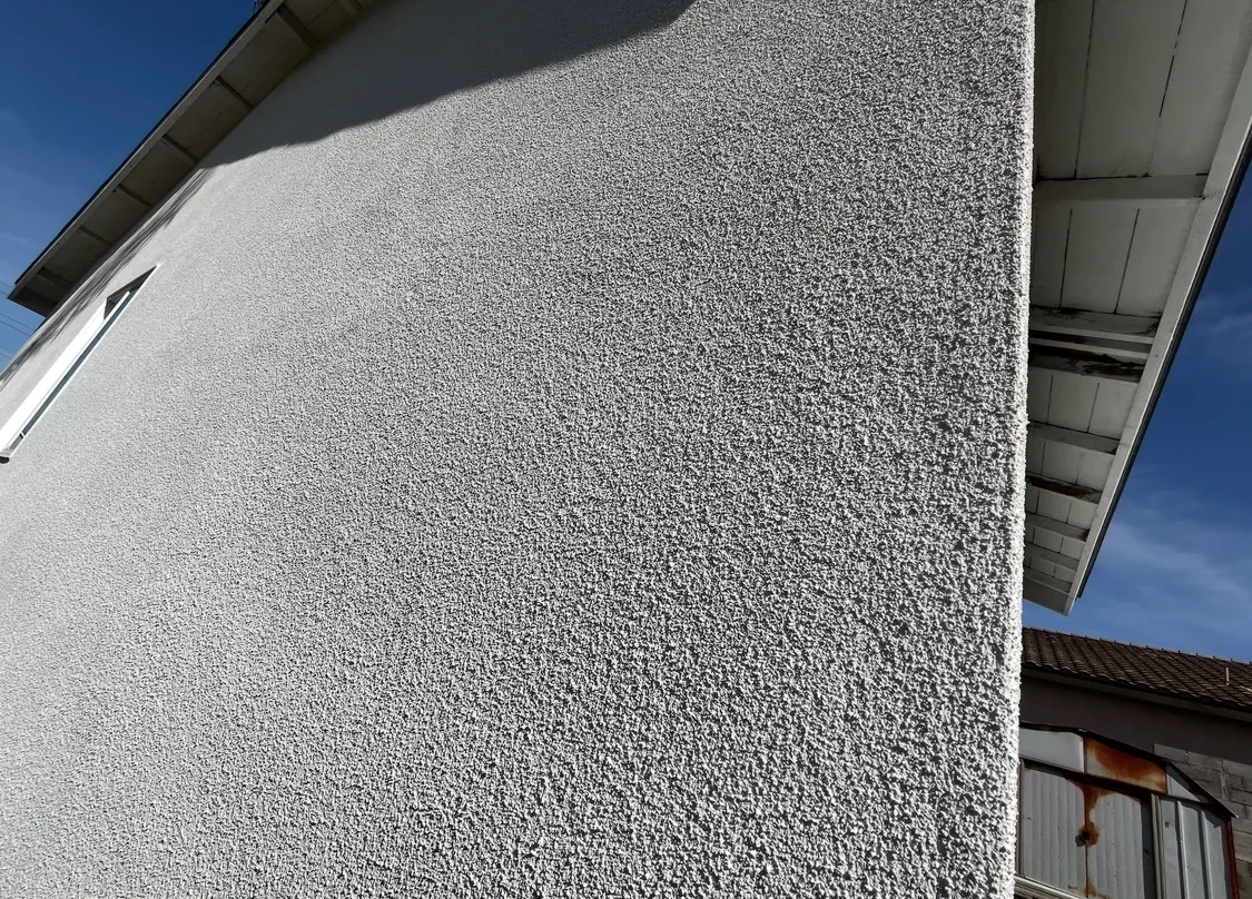 Finished exterior texture wrapping a clean building corner