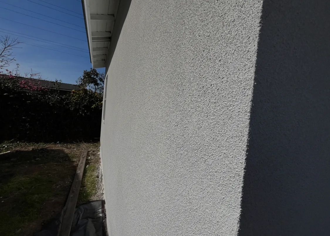 Finished stucco texture along an exterior wall